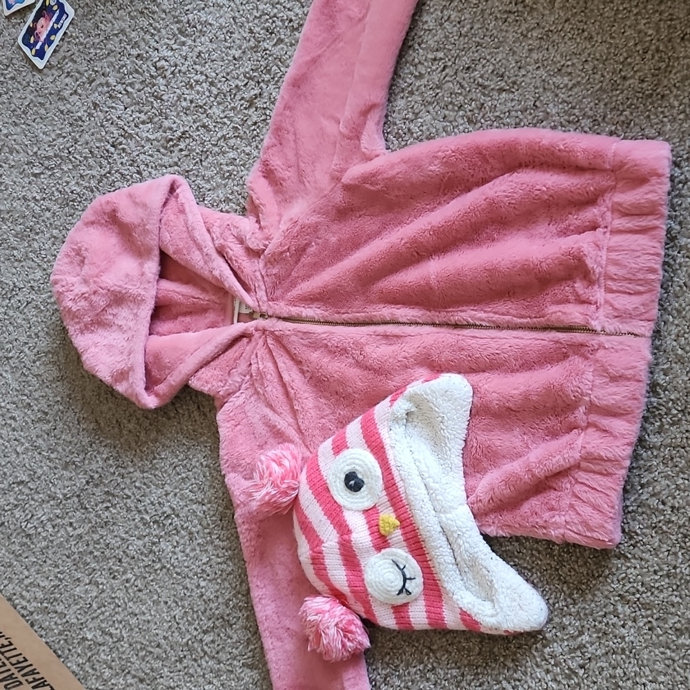 A very fluffy jacket! And a cute winter hat to match